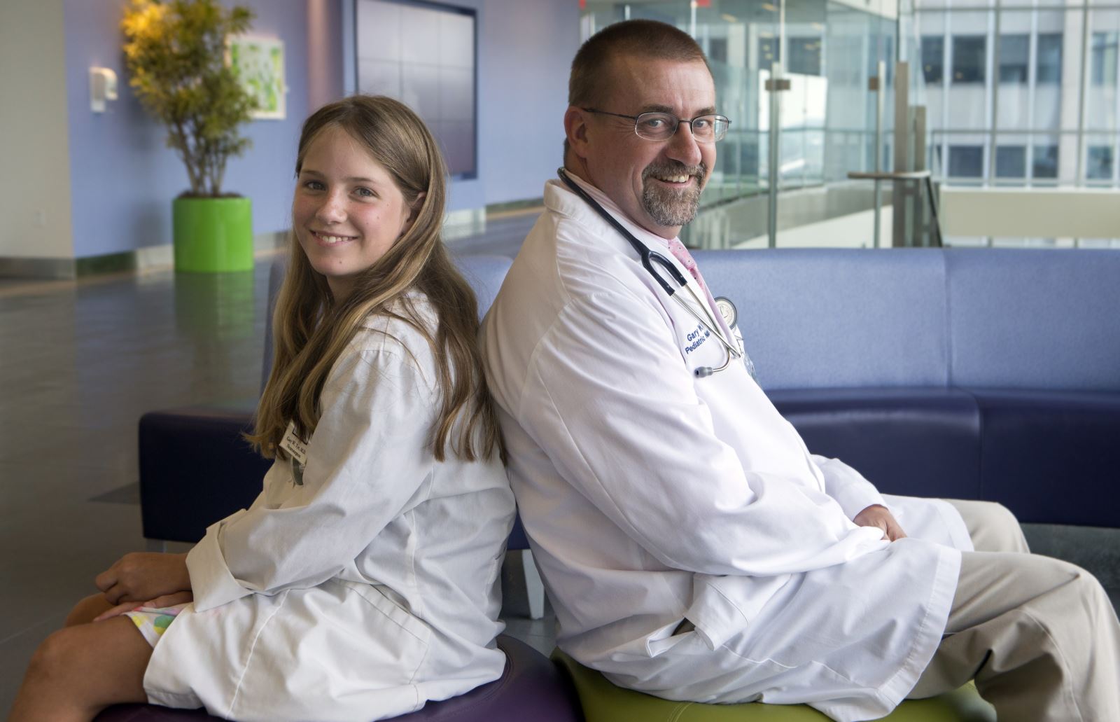 Two neurosurgeons sitting in the lobby